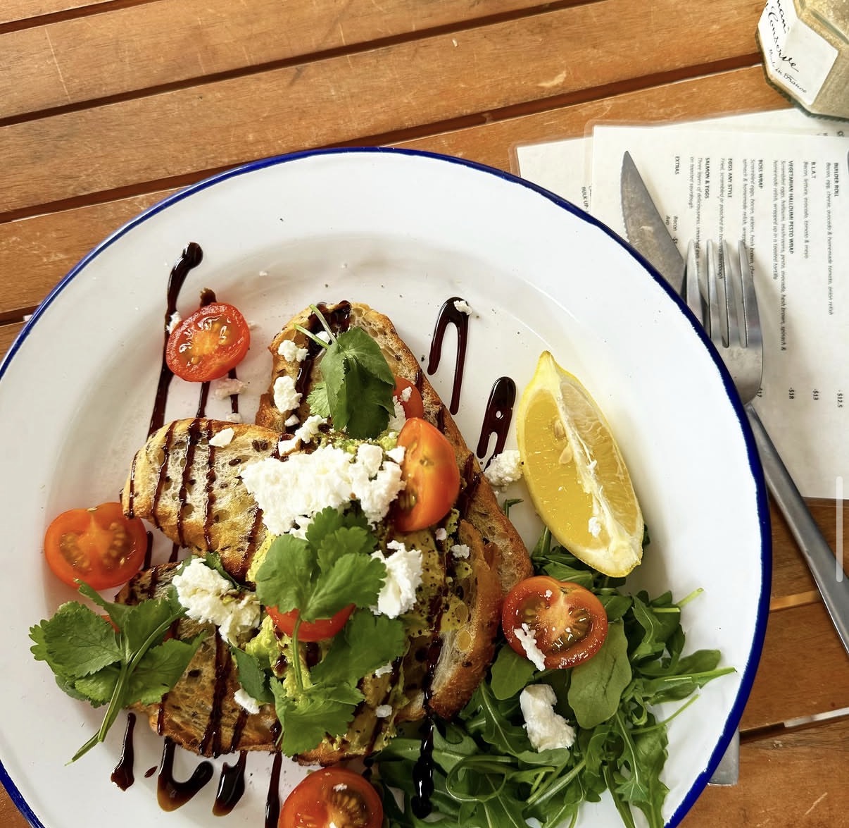 Smashed avo plate with lemon and balsamic glaze