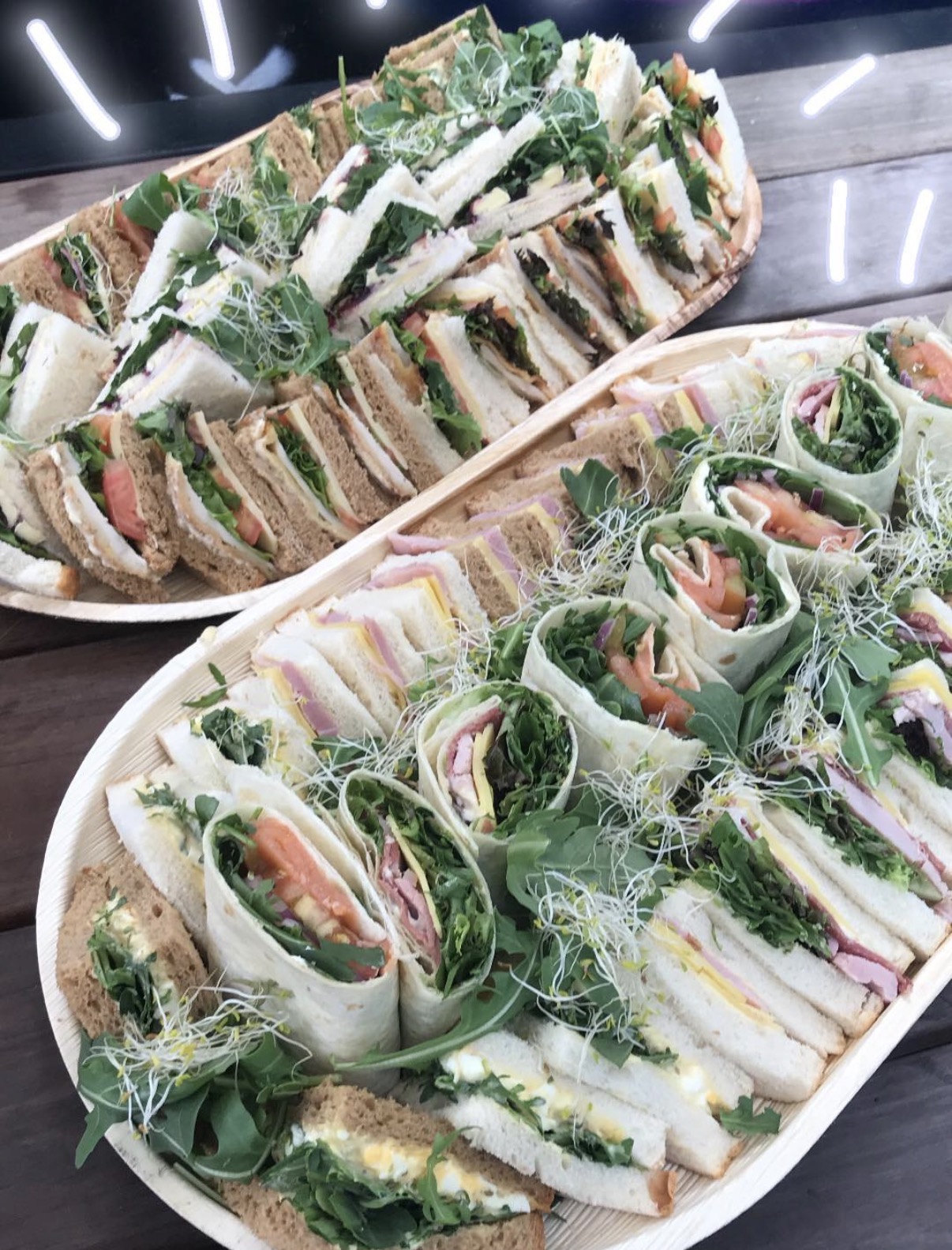 Catering platters of sandwiches and wraps